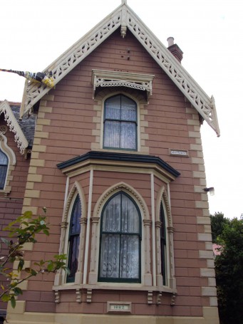Launceston. Fantastic decorated Gothic style wooden cottage called Garthowen. .