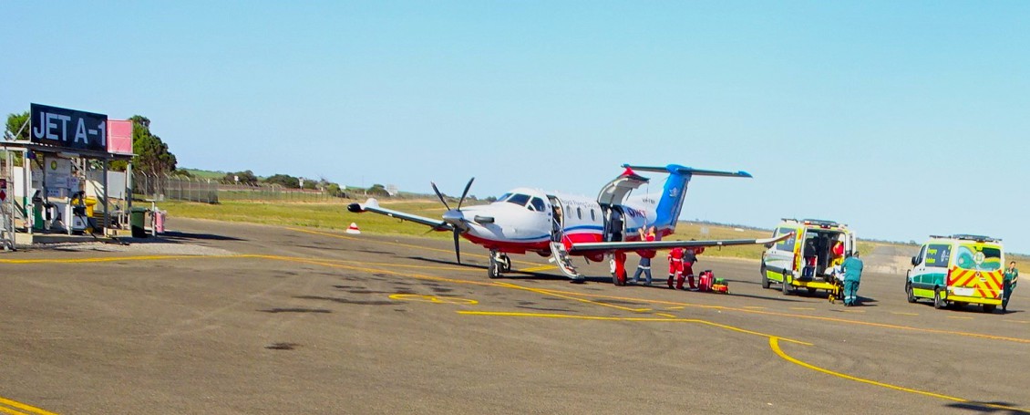 Ceduna Airport. Royal Flying Doctor aircraft and two ambulances.