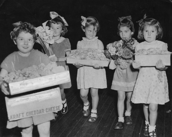 Young girls carrying flower displays at the Chelsea flower show in Brisbane 1952