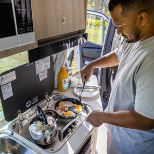 Apollo Euro Tourer AU Man at Stove
