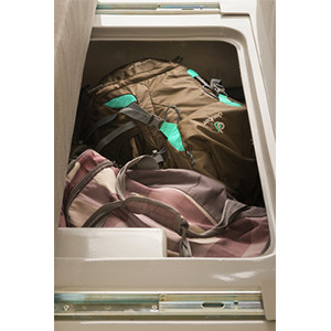 Jucy Crib Campervan – 2 Berth – driver area – luggage
