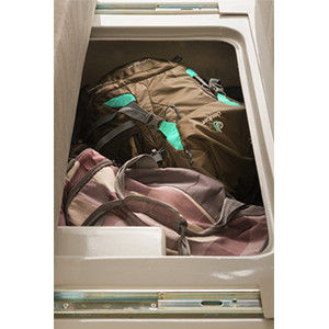 Jucy Crib Campervan – 2 Berth – driver area – luggage