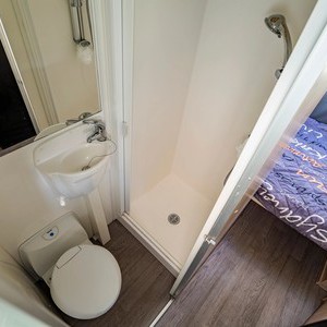 Mighty Big Six AU Shower Toilet and Rear Bed Interior