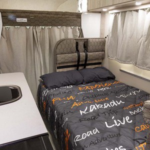 Mighty Big Six Motorhome 6 Berth AU Interior Front Dinette Bed
