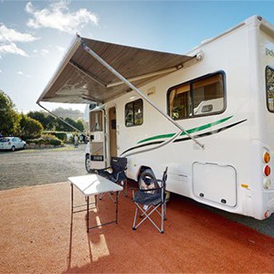 go-cheap-henty-motorhome-4-berth-exterior-rear-with-awning