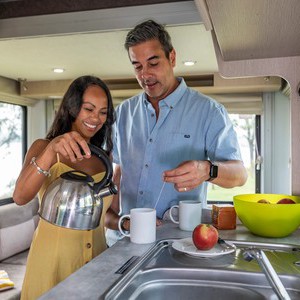 maui Cascade 4 Berth AU Interior Couple At Kitchen Sink