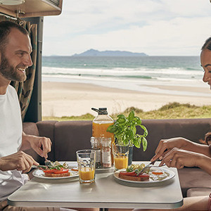 maui-ultima-2-berth-motorhome-interior-couple-eating