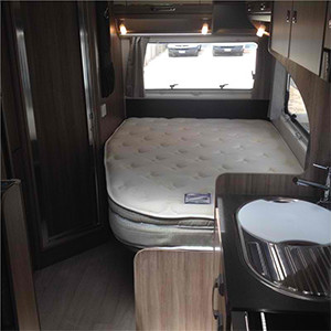 Serenity Conquest Large Motorhome – 4 Berth – bed