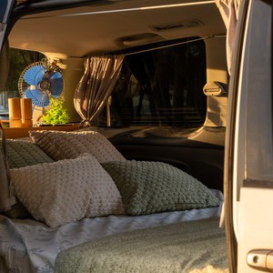 AW CP Campervan – 2 Berth AU Interior Bed At Sunset