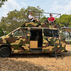 Camo Camper – 3 Berth – setting up-rooftent