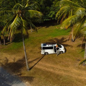 AW BD Campervan – 2 Berth AU Exterior Aerial Palm Grove View