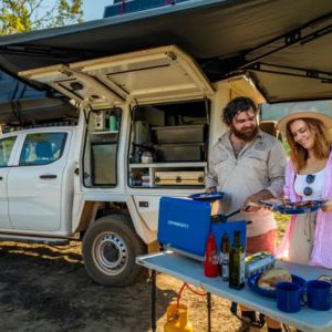 Britz Warrior 4wd 4 Berth AU Exterior Open Side Kitchen Setup View