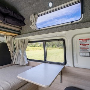 Mighty DeLITE AU Rear Dining Table and Stowed Bunk Mighty DeLITE AU Rear Dining Table and Stowed Bunk