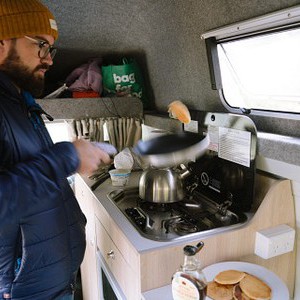 Mighty HiLITE AU Man Cooking in Kitchen