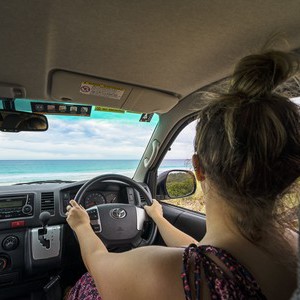 Mighty HiLITE AU Woman Driving toward Beach