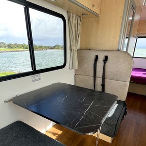 Jucy Chilld Big Kahuna 6 Berth AU Interior Dinette Table Seats